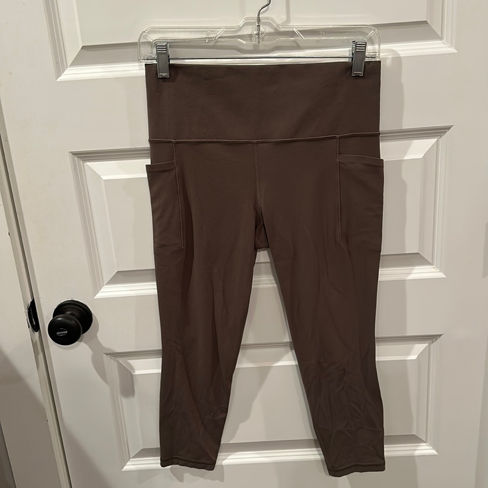Athleta salutation stash leggings size medium petite